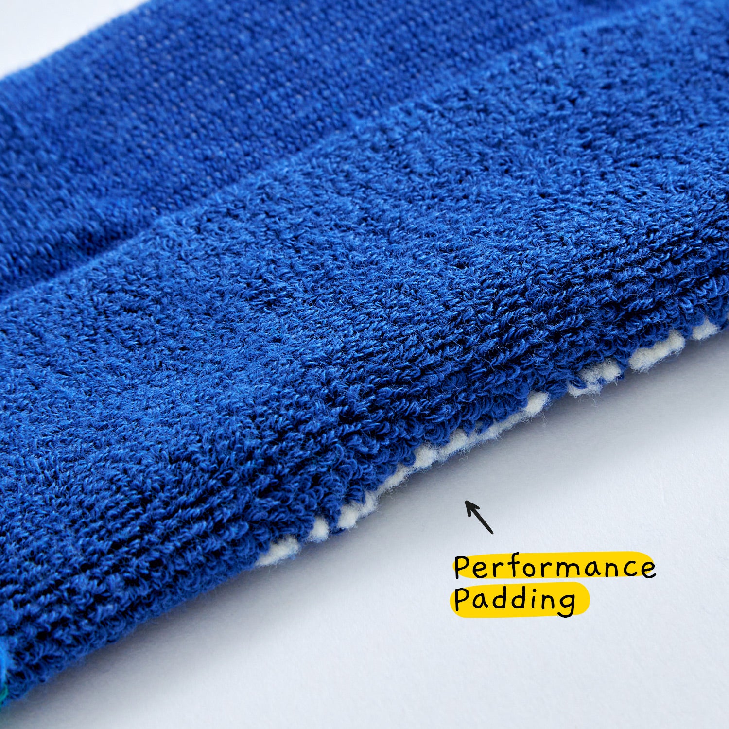 Close-up of bottom-to-heel terry padding on hiking socks designed for support and reduced friction